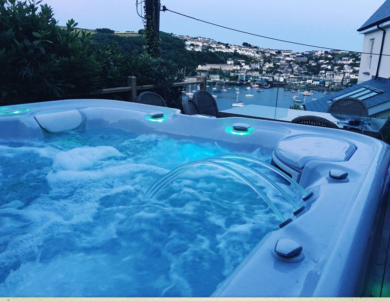 Hot tub with lights overlooking Fowey harbour