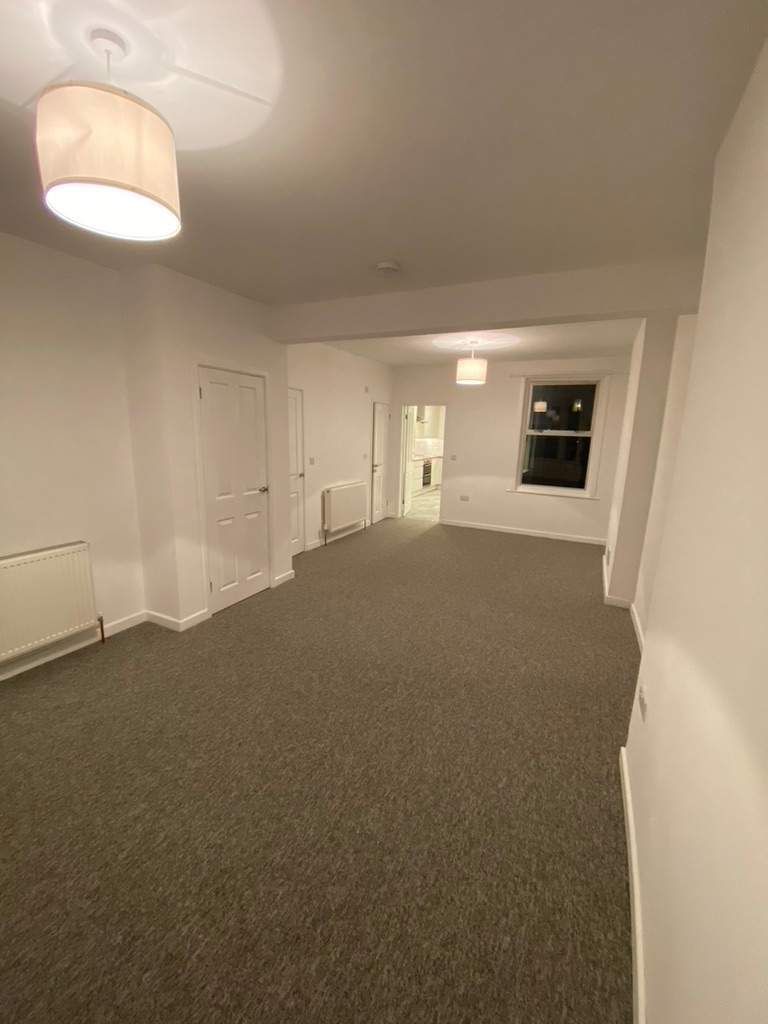 Open-plan living and dining area after renovation
