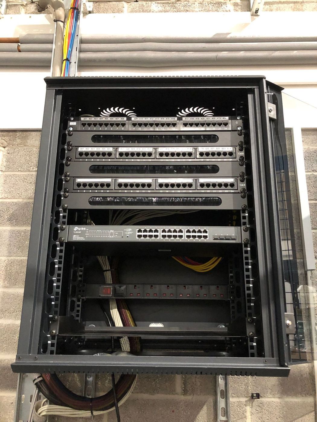 Data cabinet with patch panels